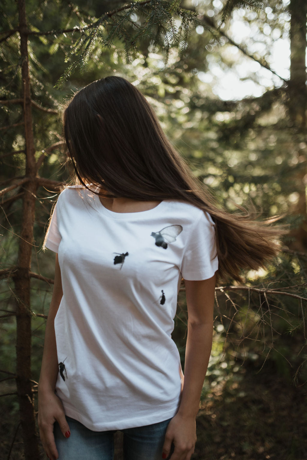 White shirt with flying bugs
