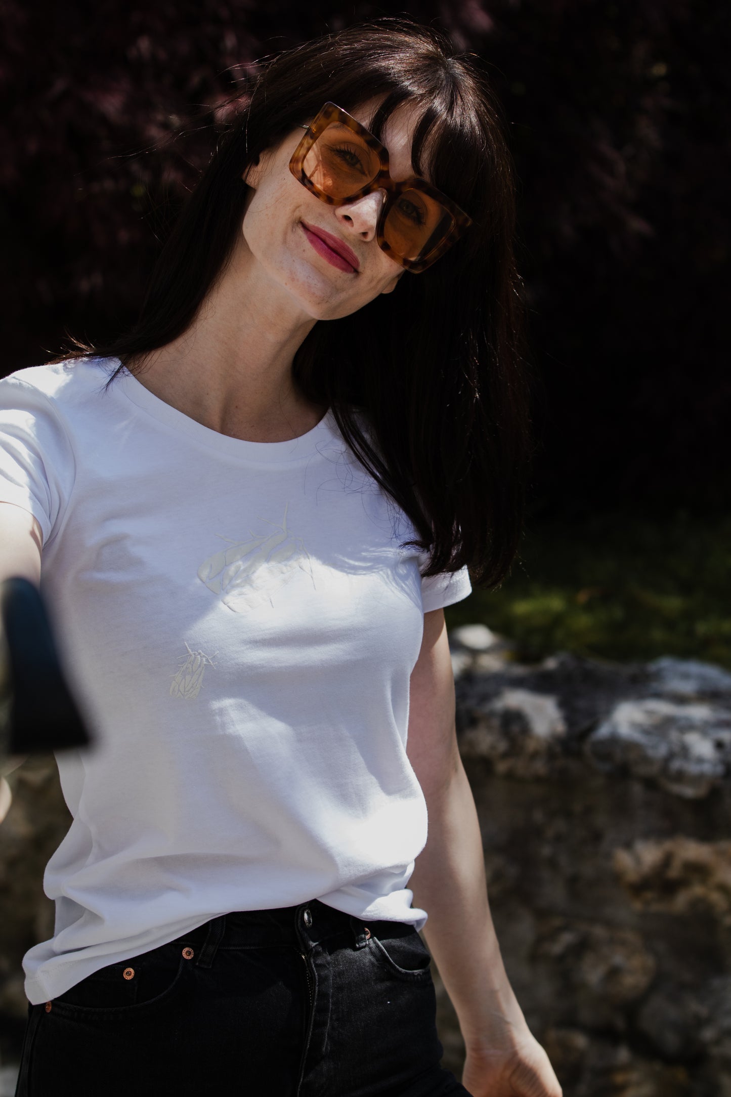 White T shirt and two small 3D bugs