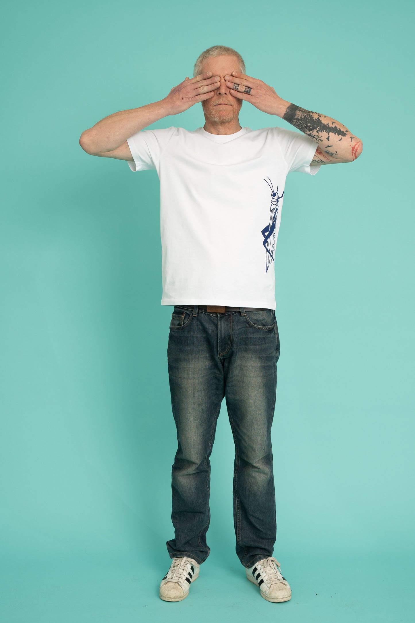 Mens tee with a blue and red grasshopper