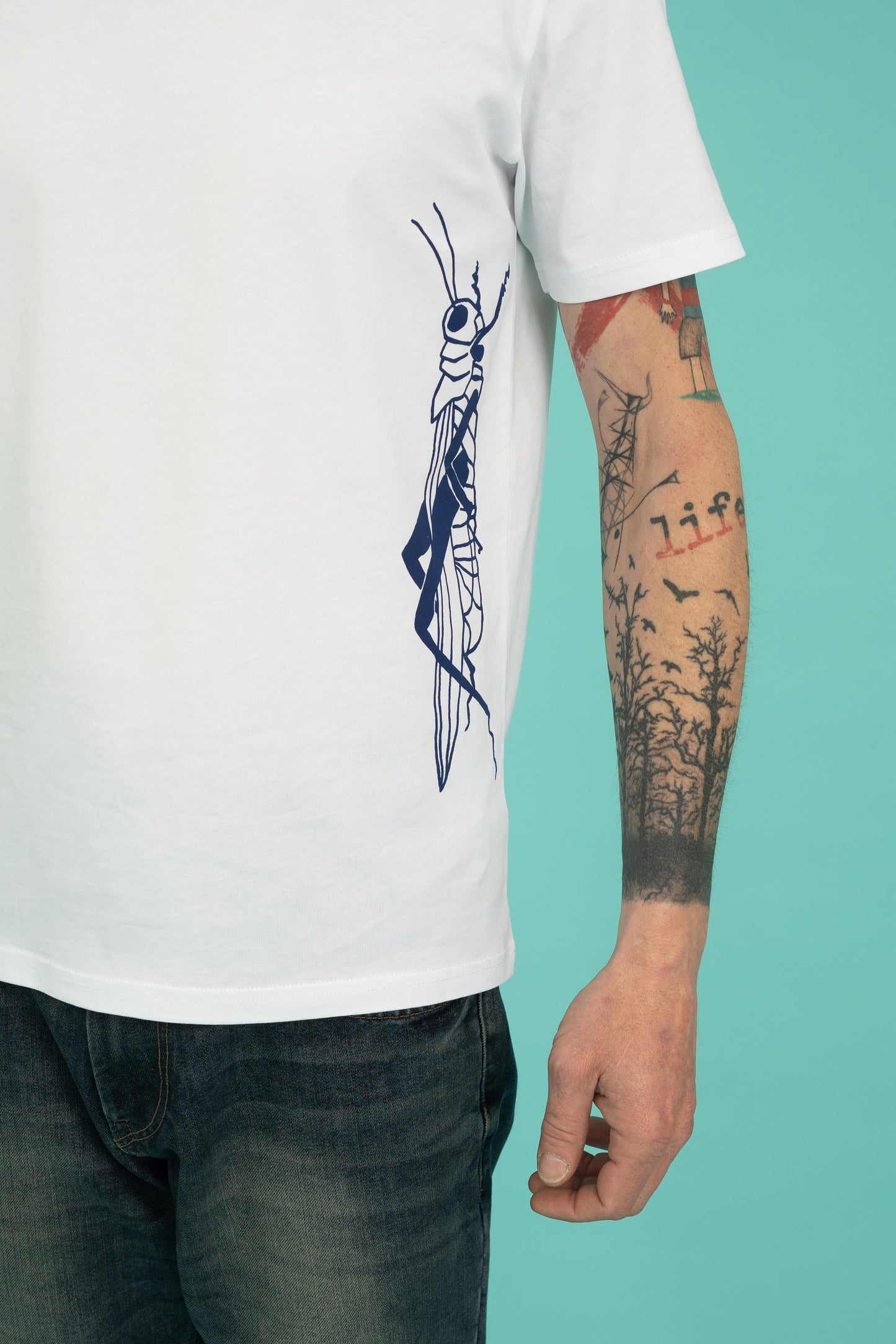 Mens tee with a blue and red grasshopper
