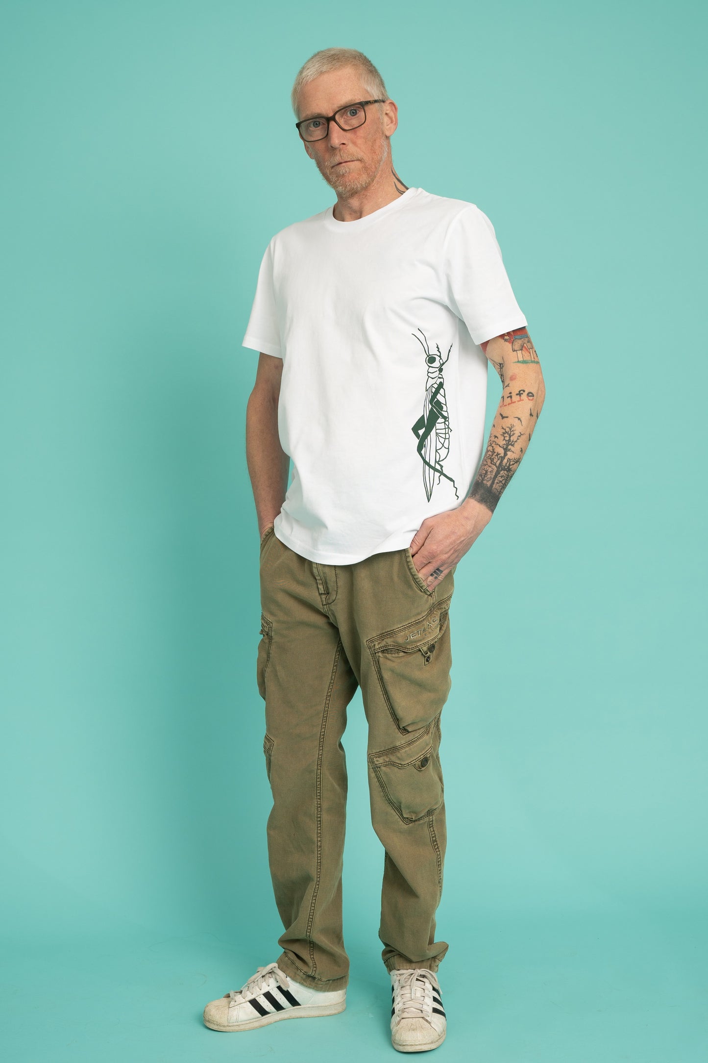 Green grasshopper on unisex tee
