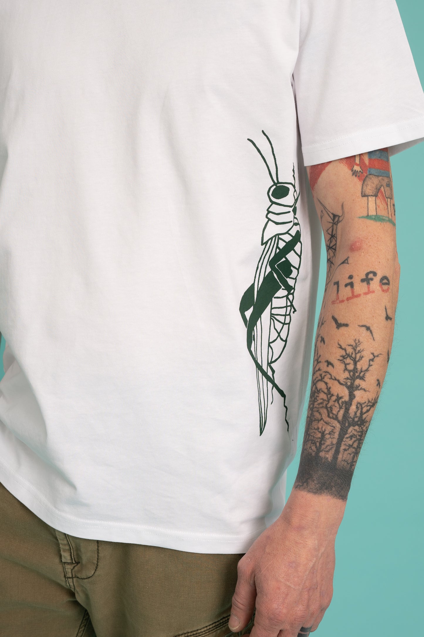 Green grasshopper on unisex tee