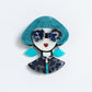 Brooch woman in blue