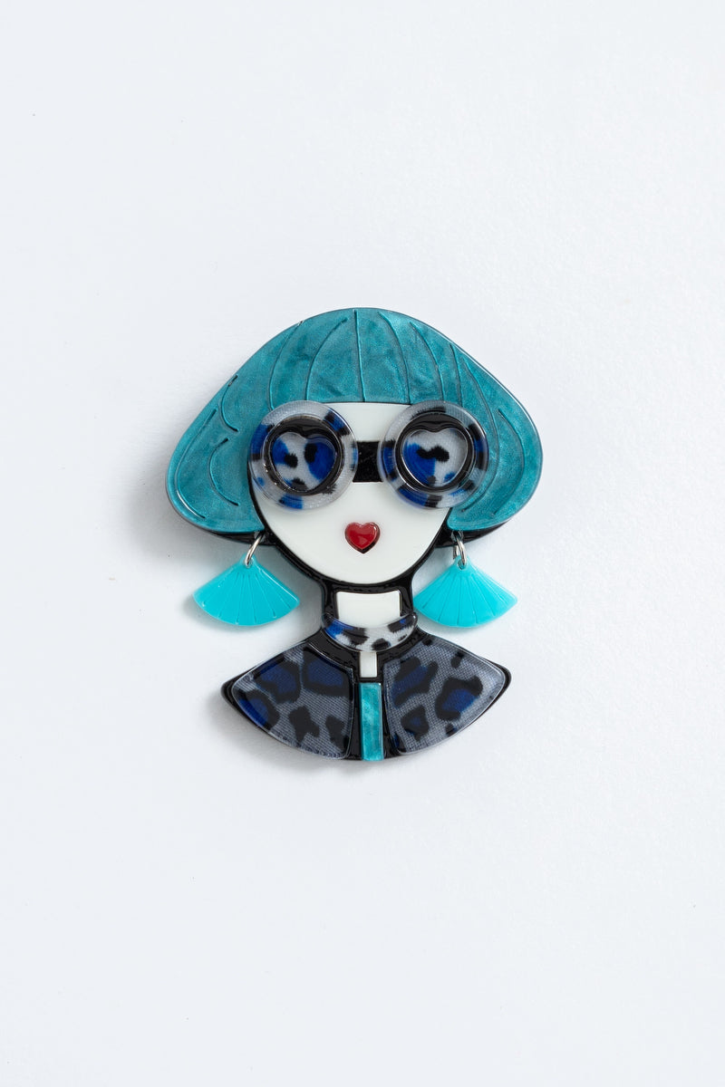 Brooch woman in blue