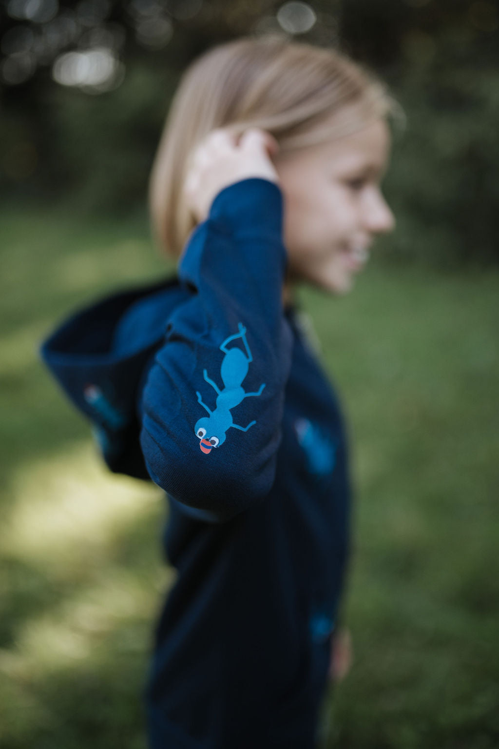 Children's blue jacket with ants