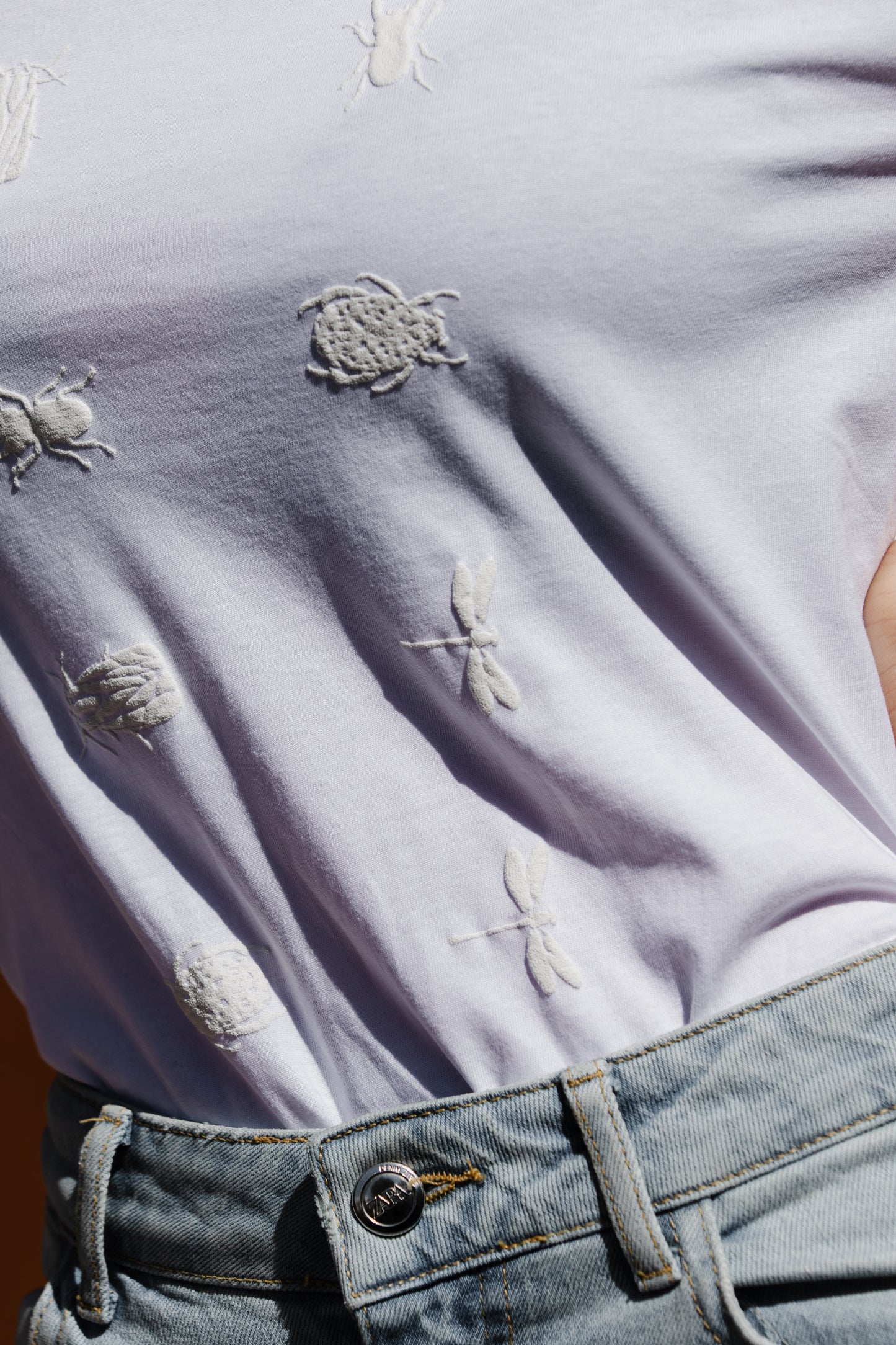 White T shirt and small 3D bugs
