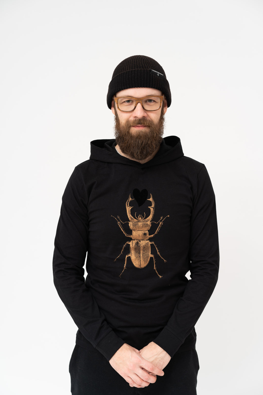 Hooded t shirt with bronze scarab and black plush heart