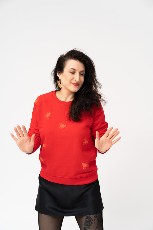 Red sweater and 3D print flies 