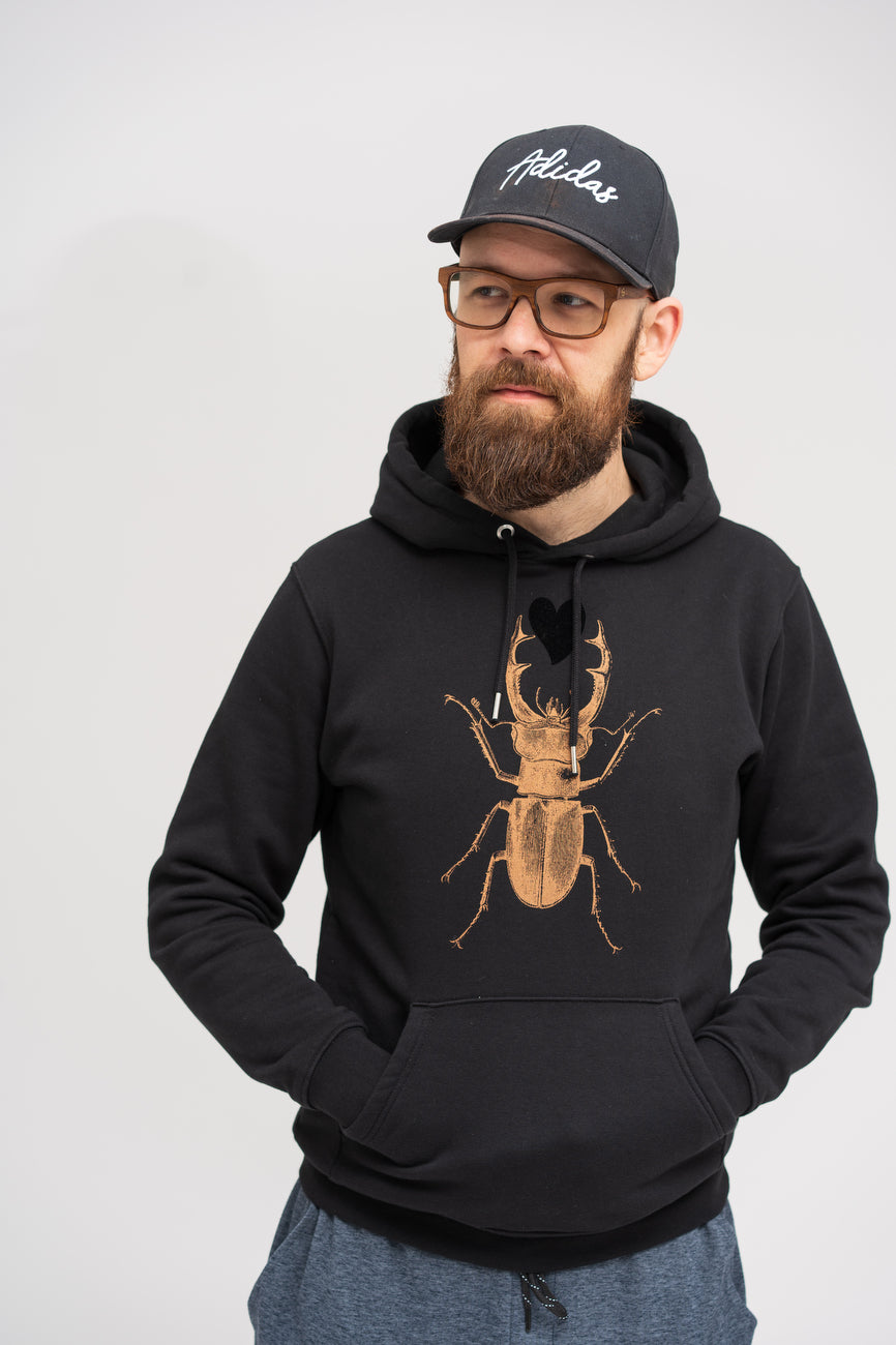 Iconic unisex black hoodie with bronze scarab and black heart