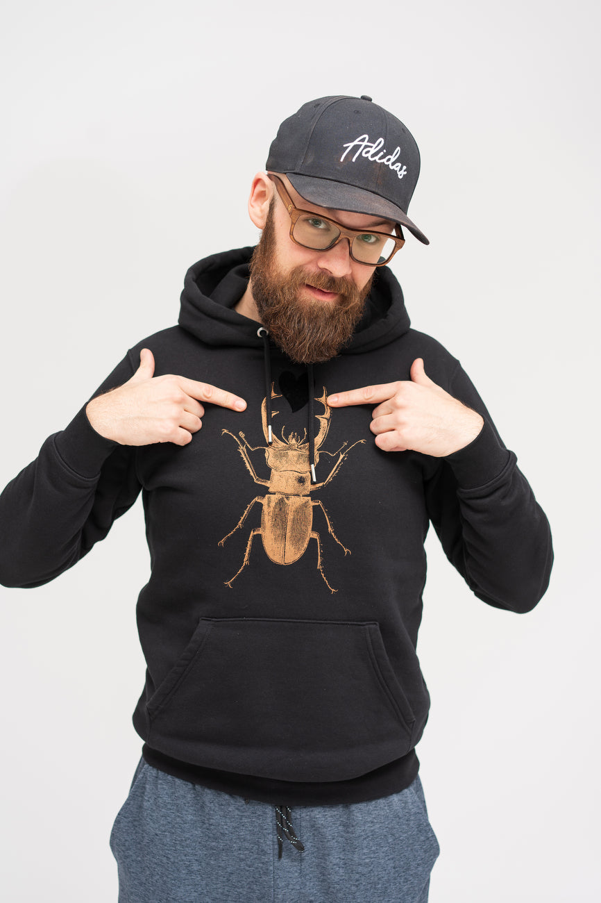 Iconic unisex black hoodie with bronze scarab and black heart