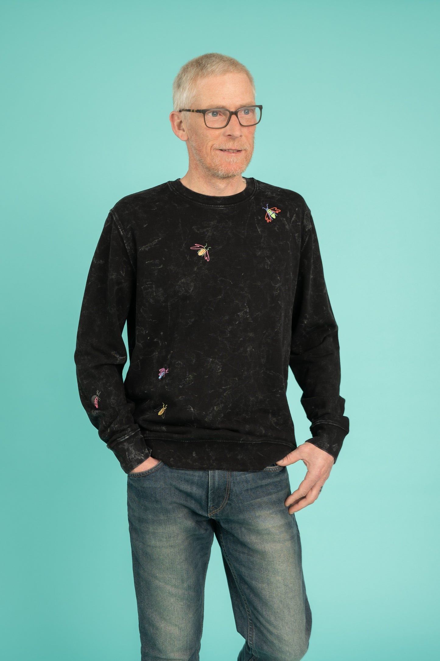 Black splatter sweater with a small bugs