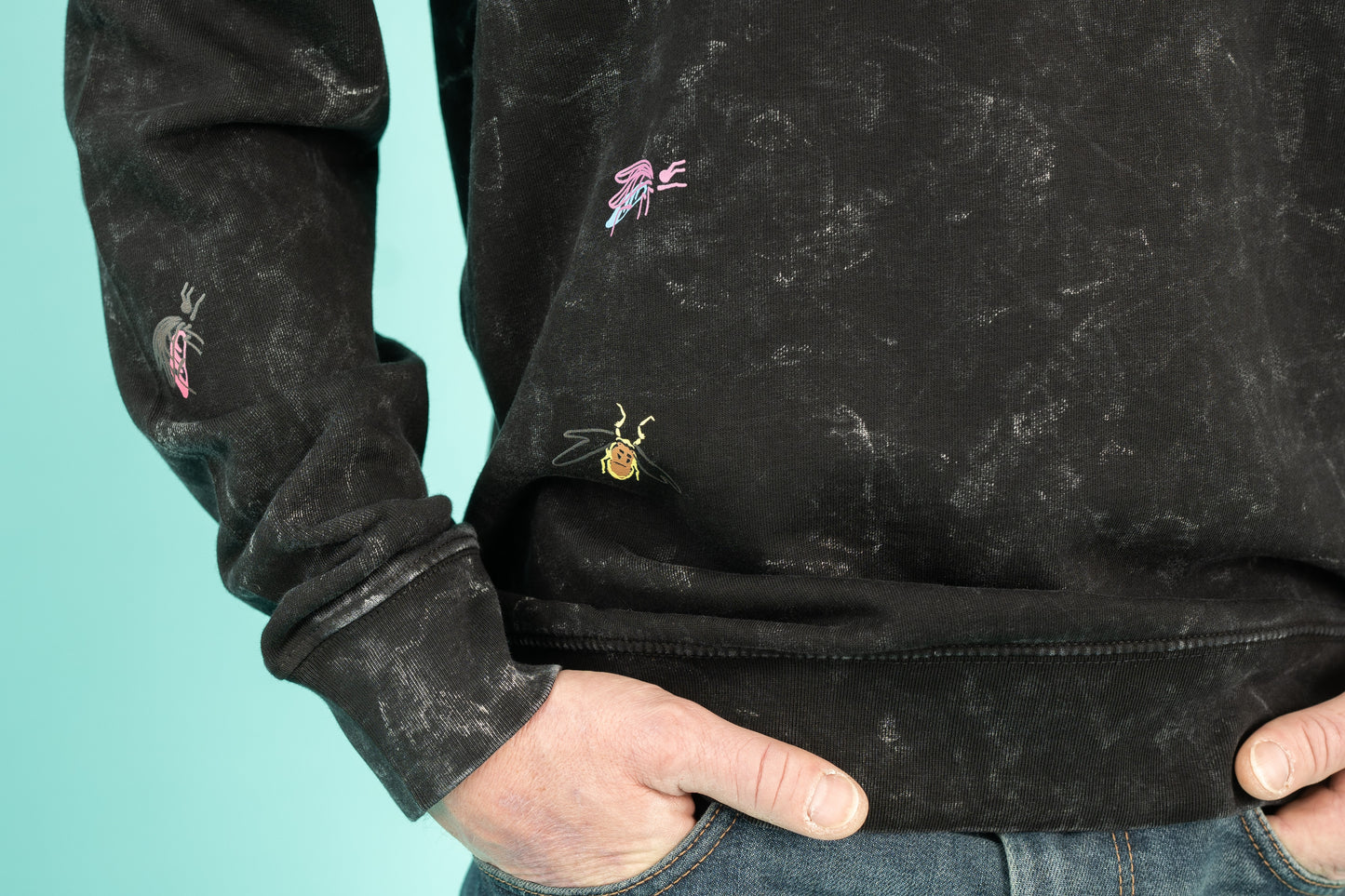 Black splatter sweater with a small bugs
