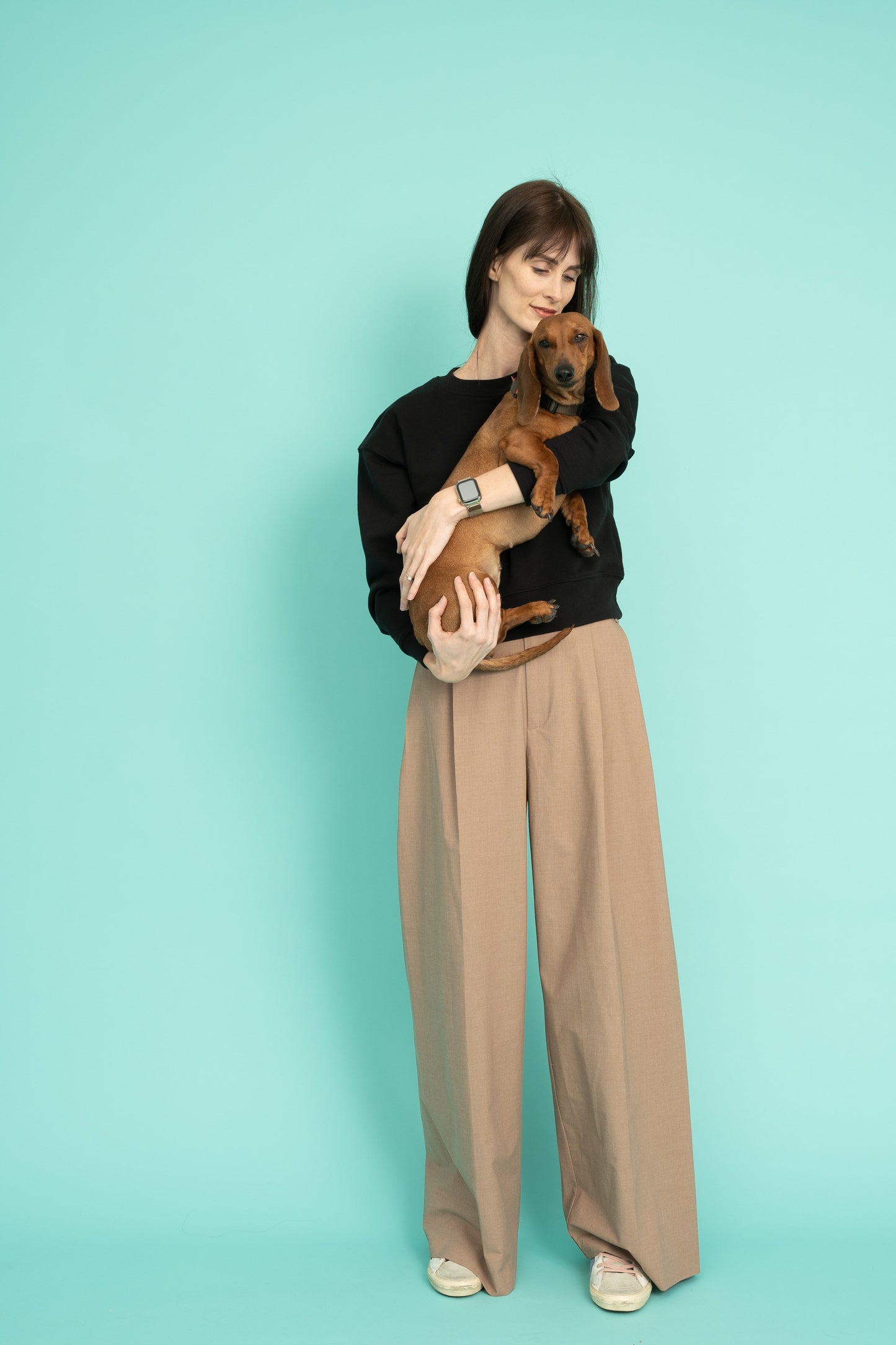 Black cropped crew neck sweatshirt with a grasshopper on the sleeve