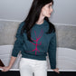 Sweater with a pink walking stick