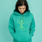Turquoise hoodie and a walking stick in front
