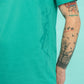 Turquoise tee with a grasshopper