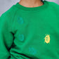 Rdeč in zelen pulover in 3D pikapolonice - organski bombaž