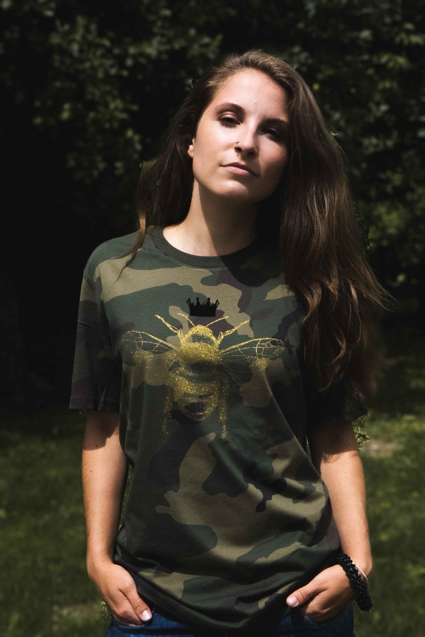 Golden bee on a military pattern tee