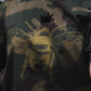 Golden bee on a military pattern tee
