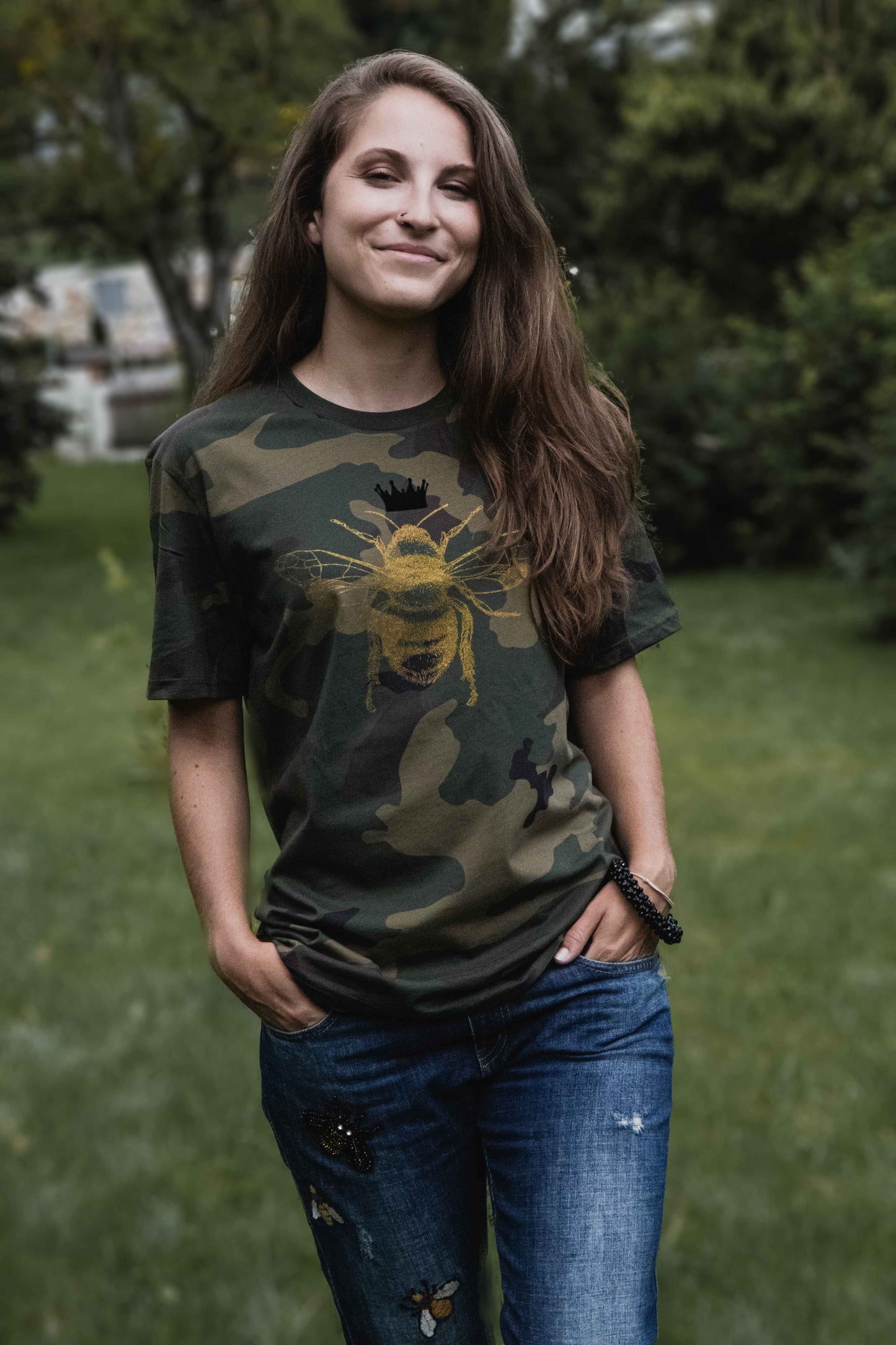 Golden bee on a military pattern tee