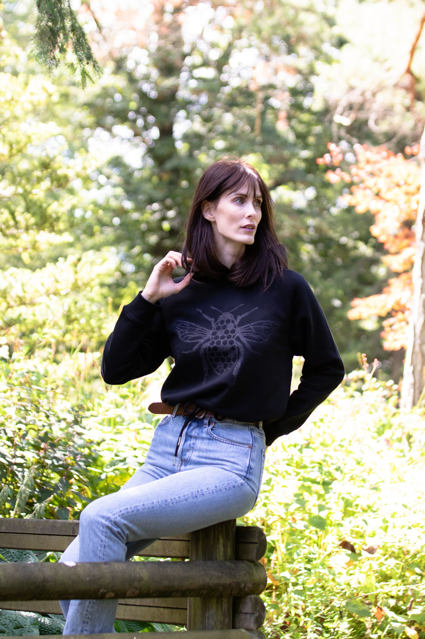 The women's cropped hoodie with a glitter Bee on the front
