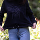 The women's cropped hoodie with a glitter Bee on the front