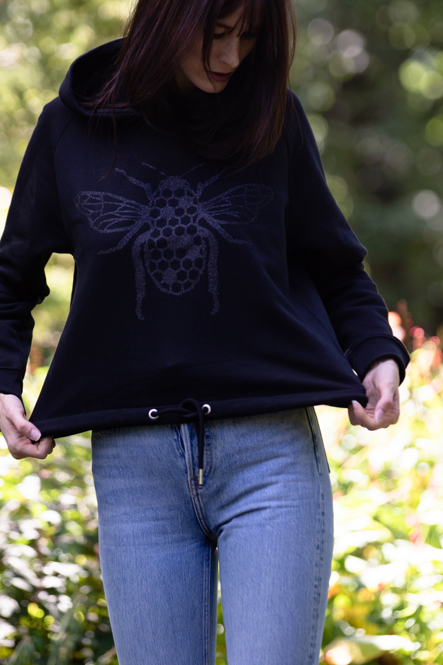 The women's cropped hoodie with a glitter Bee on the front