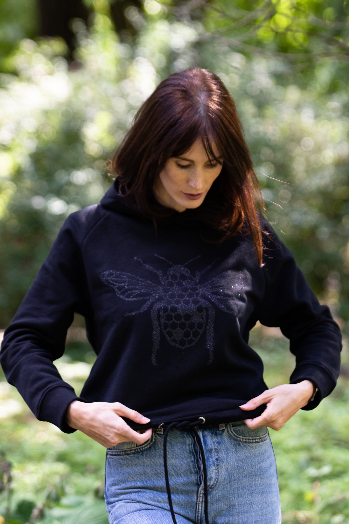 The women's cropped hoodie with a glitter Bee on the front