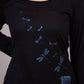 Shiny blue dragonflies fly out of boot women's tee