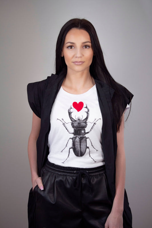 Scarab with a red plush heart women's tee